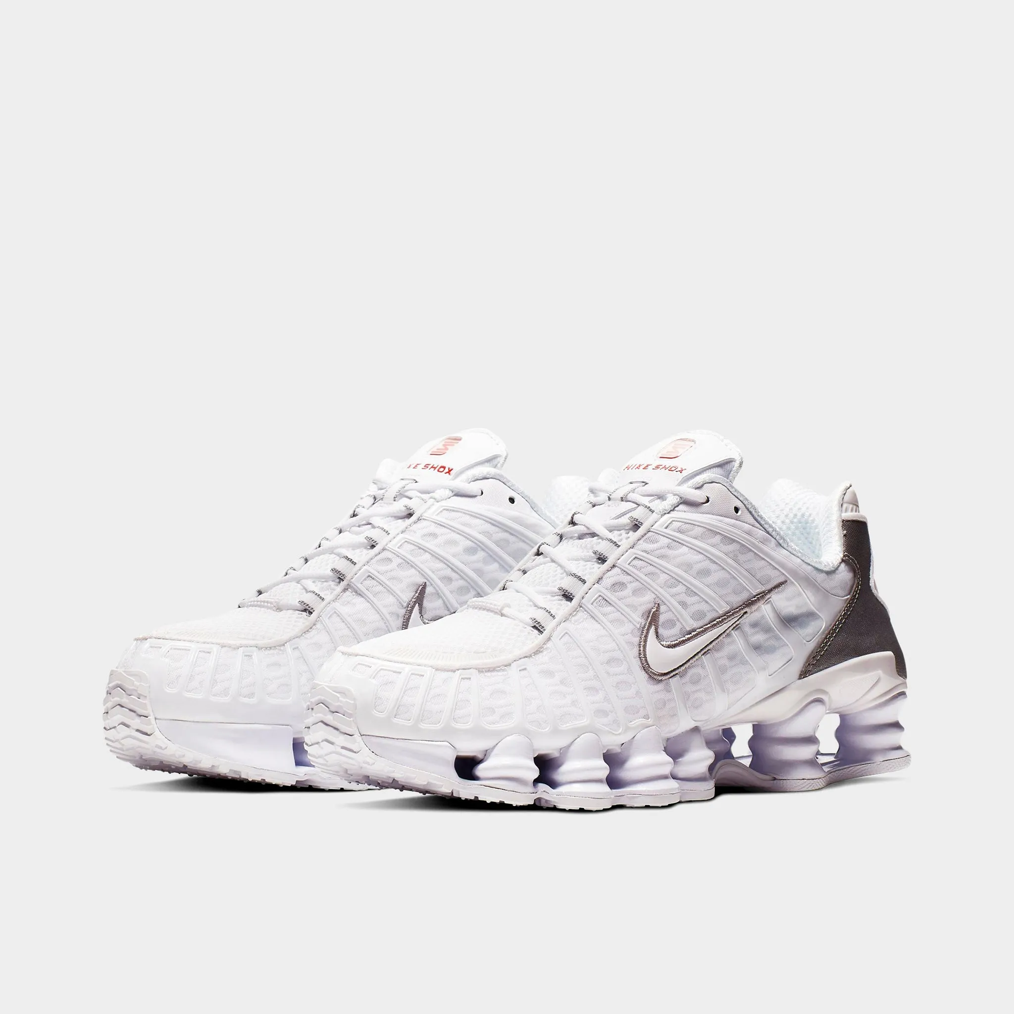 running in a relay race running alone Nike Shox TL White / White - Metallic Silver