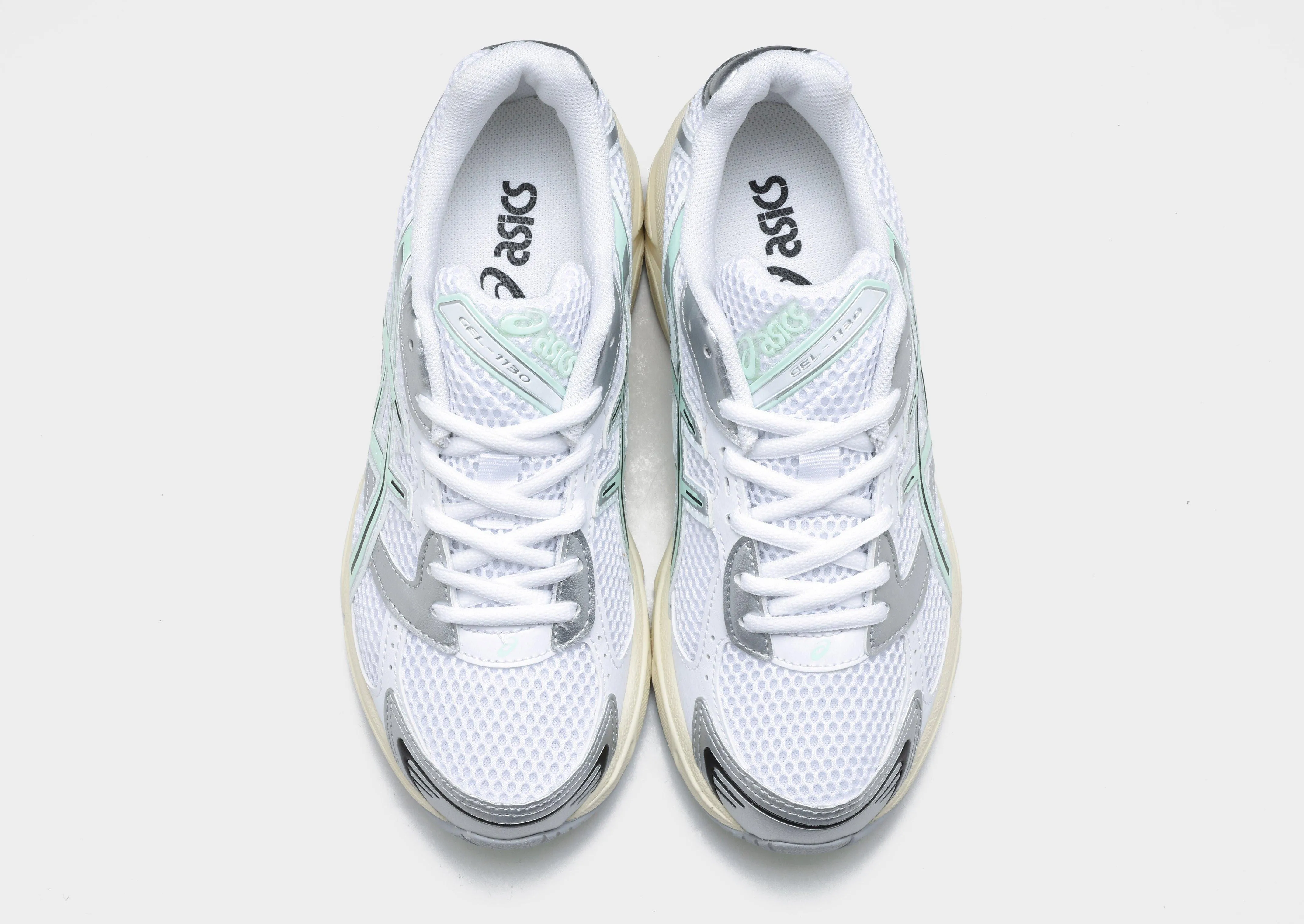 GEL-1130 Women's microfiber running in a softball field area shoes