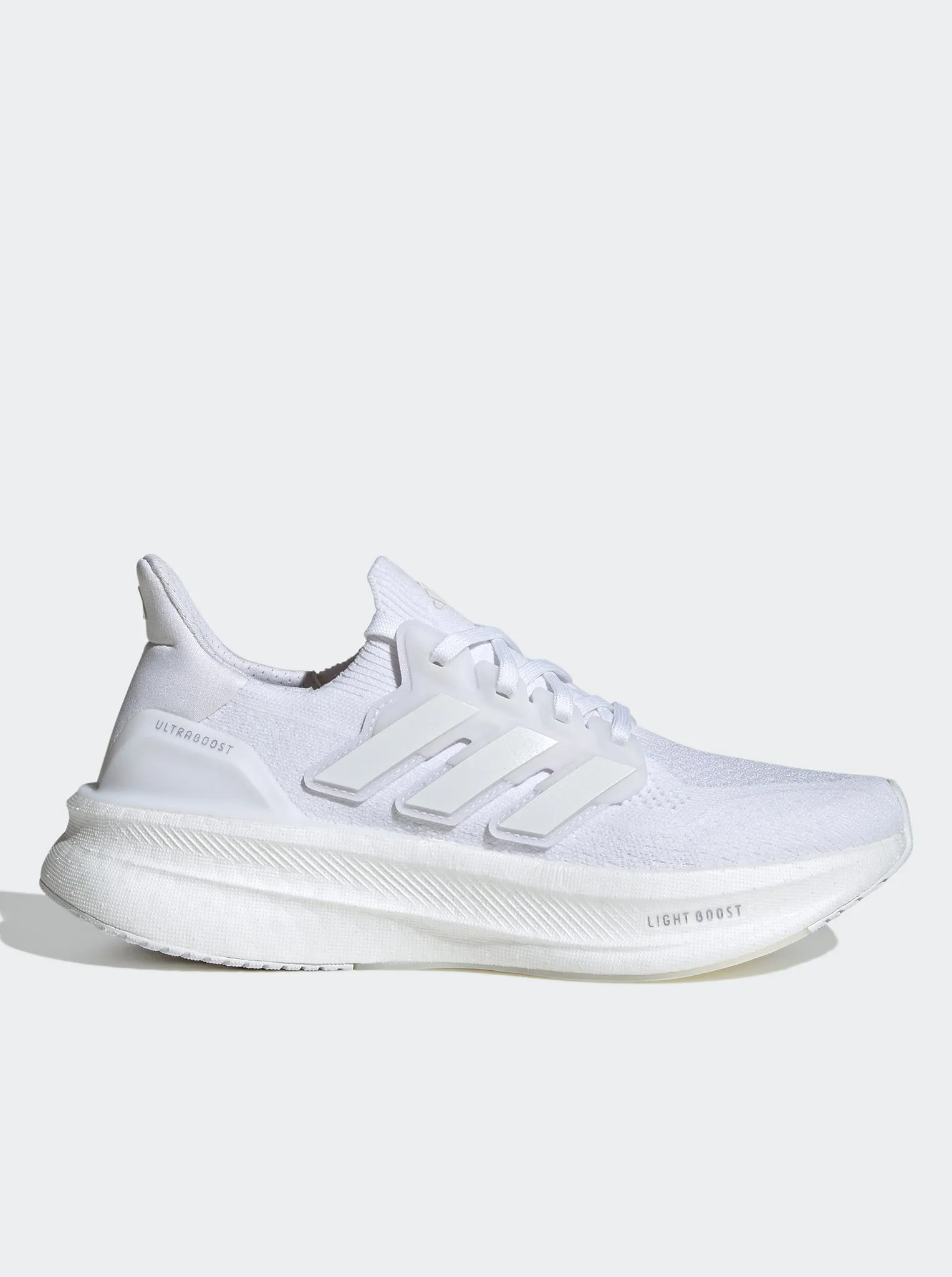 Ultraboost 5 Womens running in a metal bridge area shoes running in a city park shoes