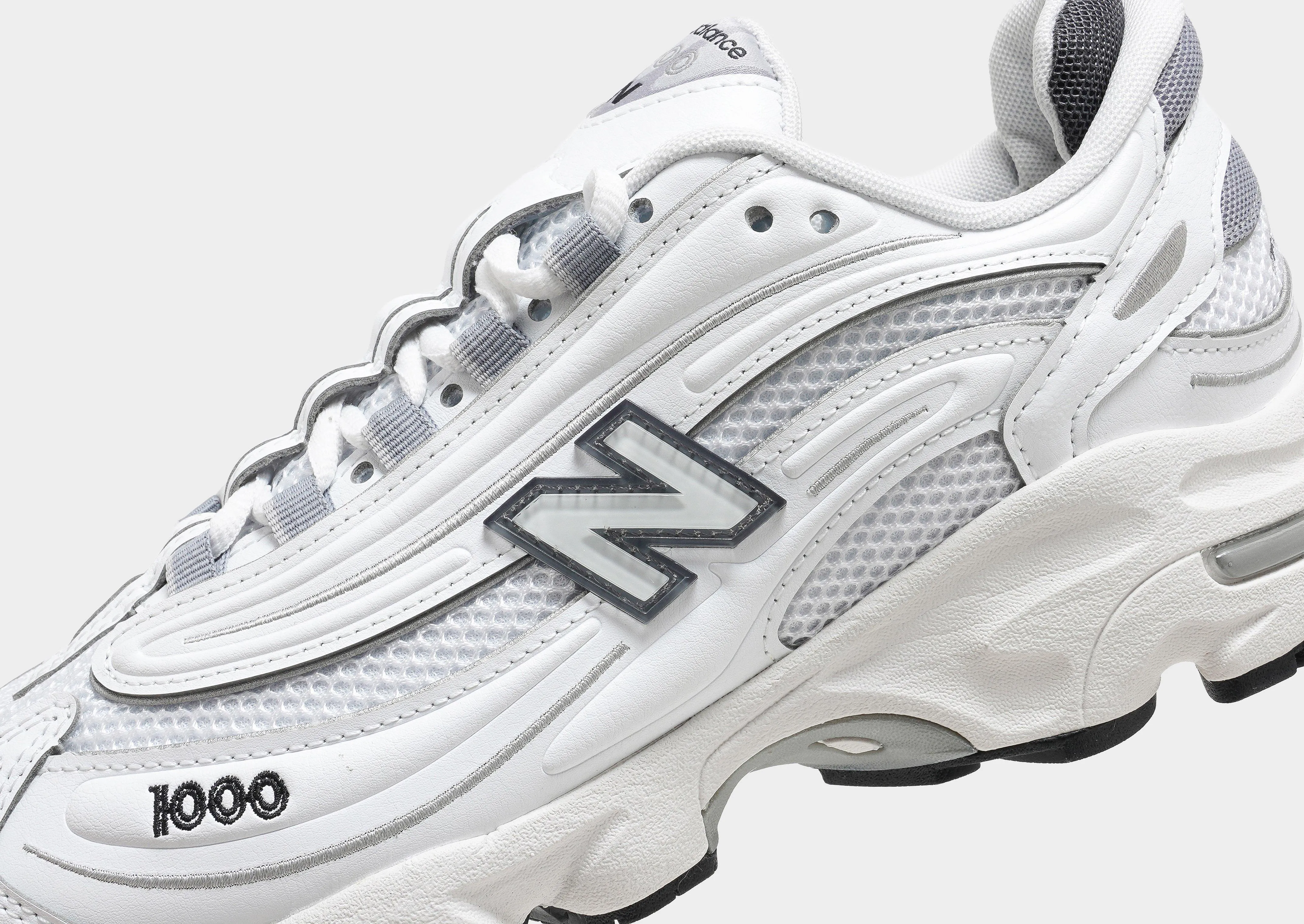 1000 running in a beach area shoes