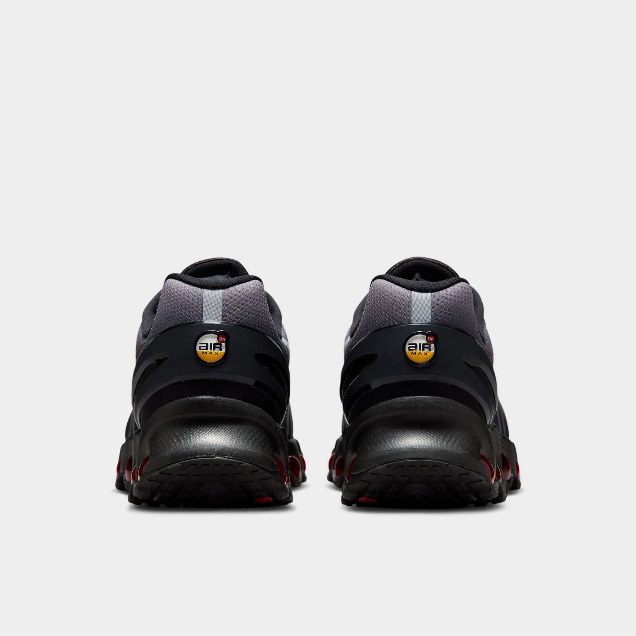 Nike Air Max DN8 Black / Gym Red - Anthracite High Abrasion Resistance running in a neighborhood