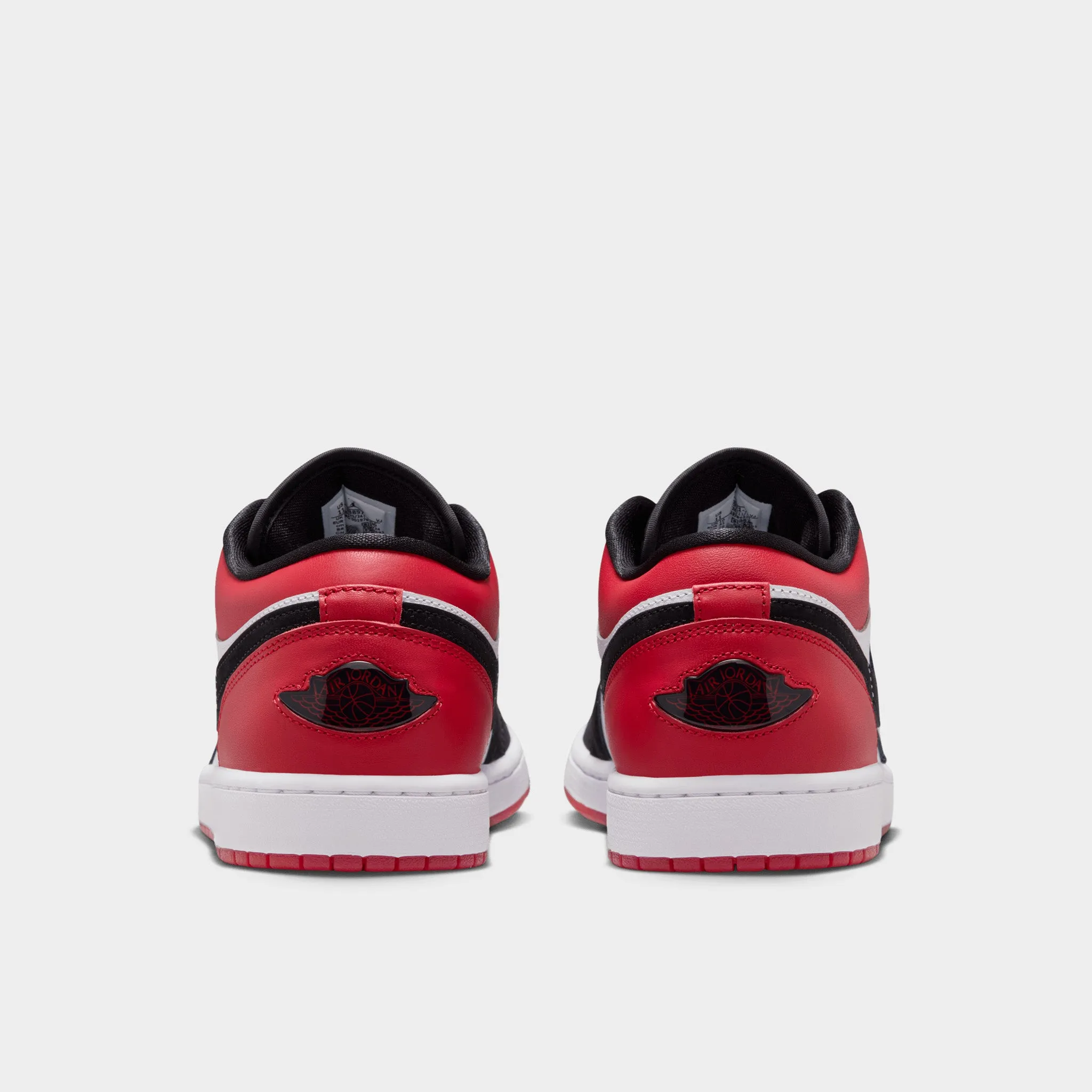 Jordan 1 Low White / Black - Varsity Red athletic style Sneaker Display