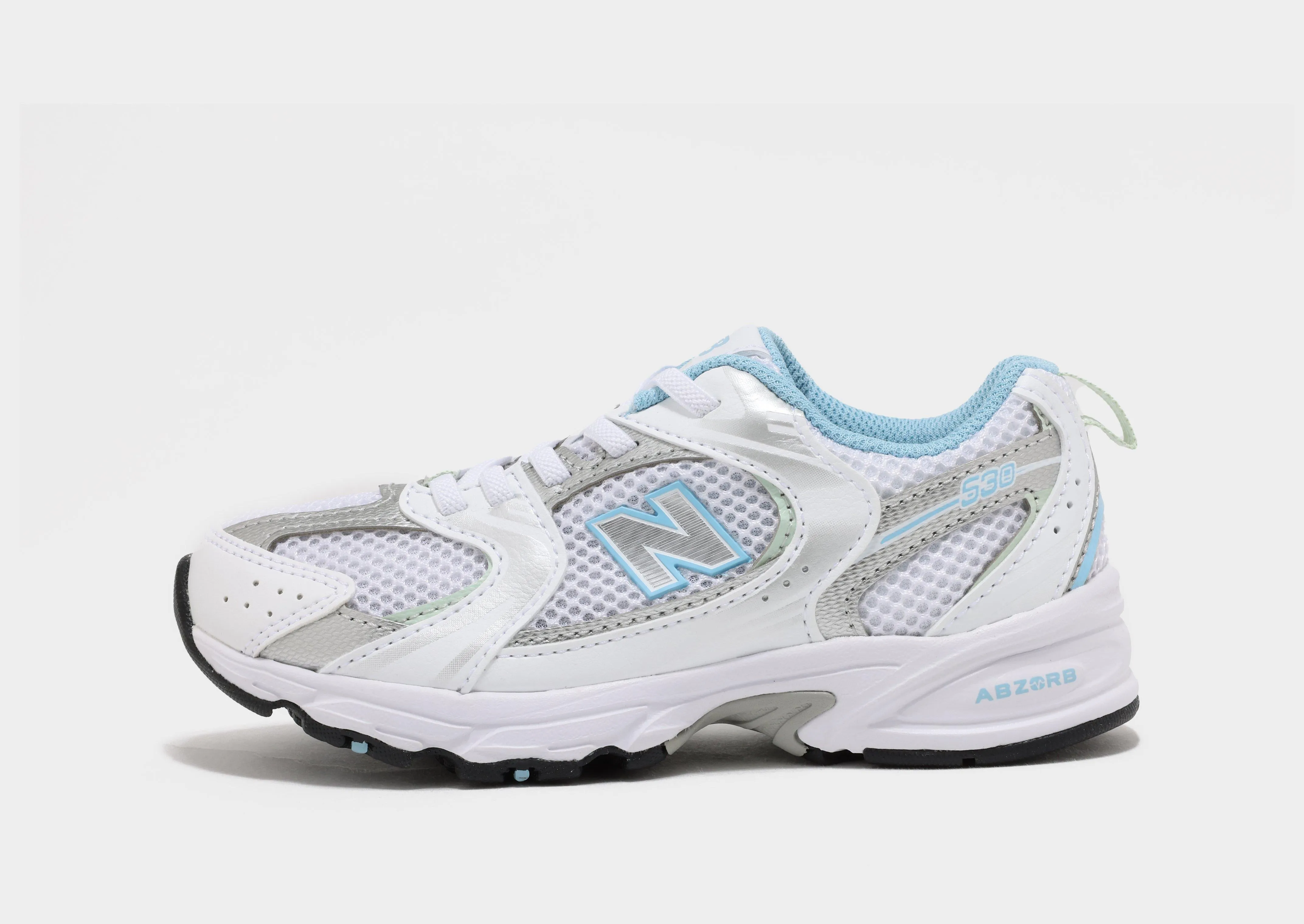 running in a baseball field area shoes 530 Children's