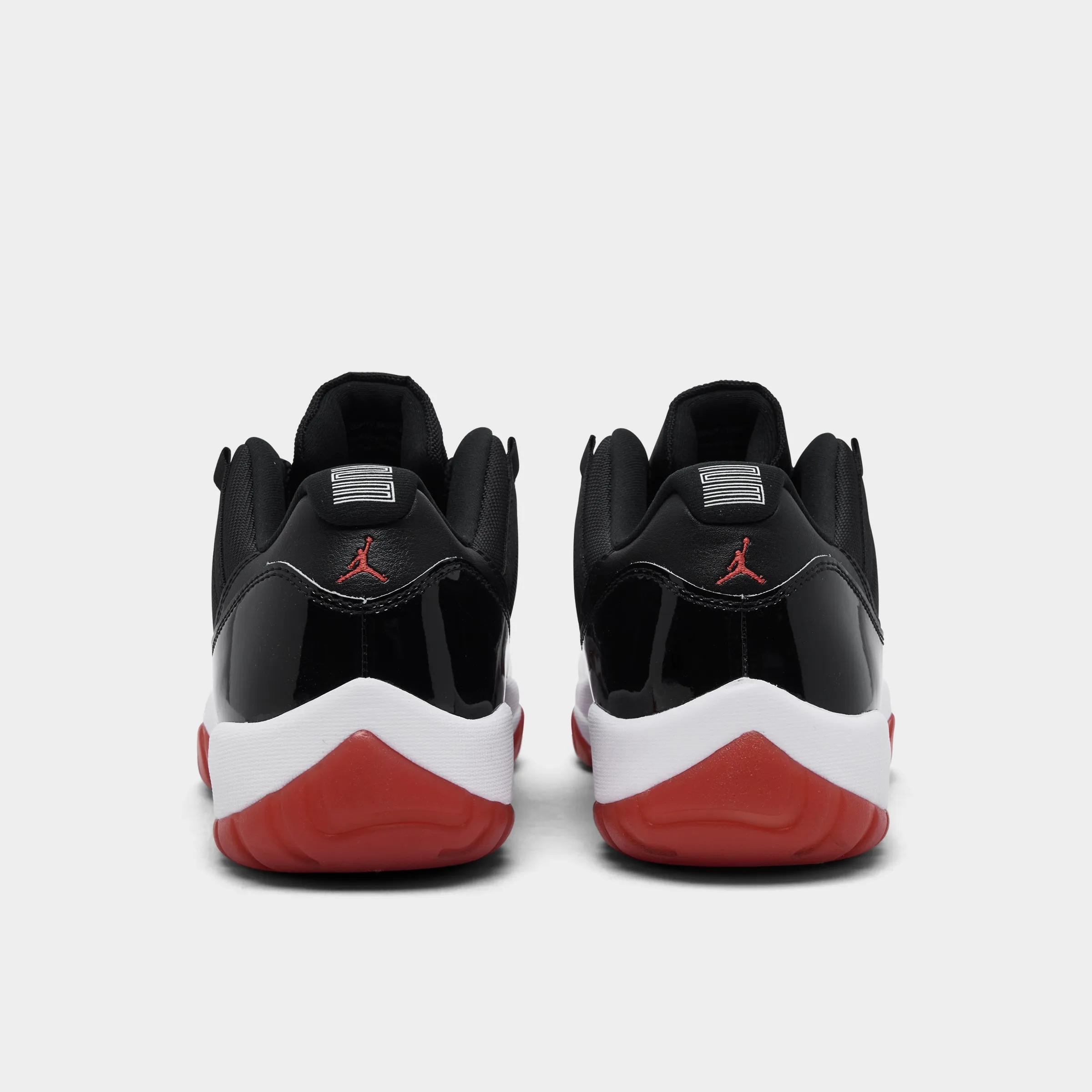 Rolling Motion Engineered Jordan 11 Retro Low Black / Varsity Red - White