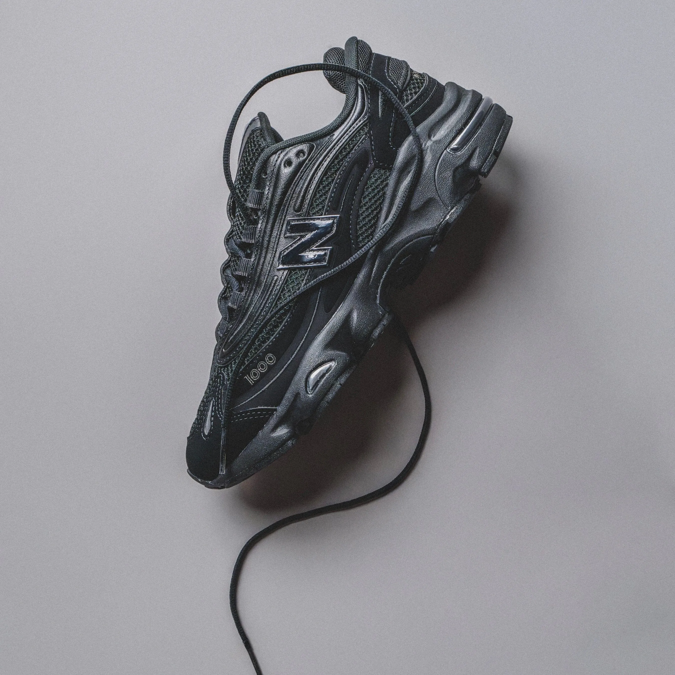 MENS New Balance | M1000 (Black Cat) Tear Resistant Textile