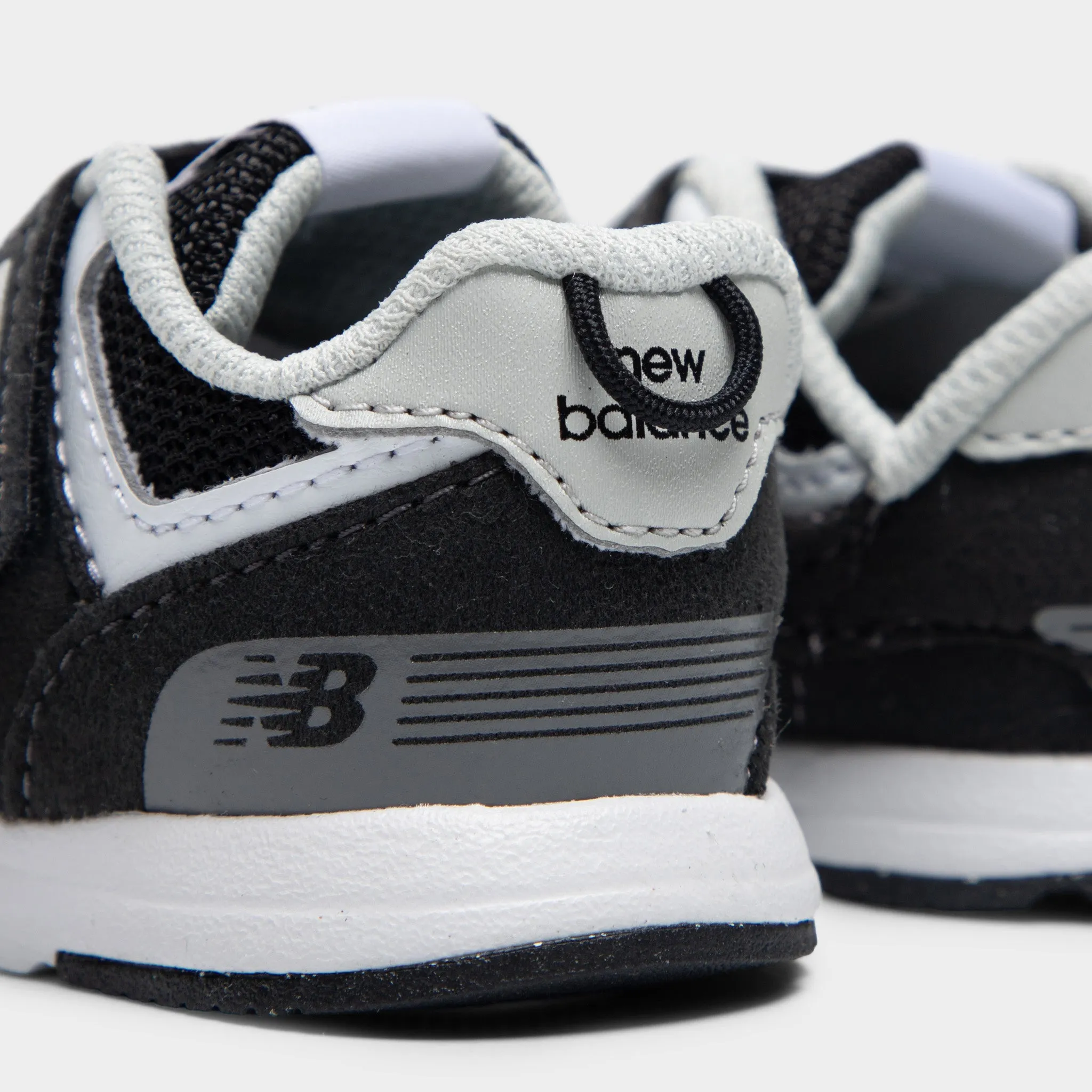 short - distance runner's shoe alternative New Balance Infants' 574 Black / White