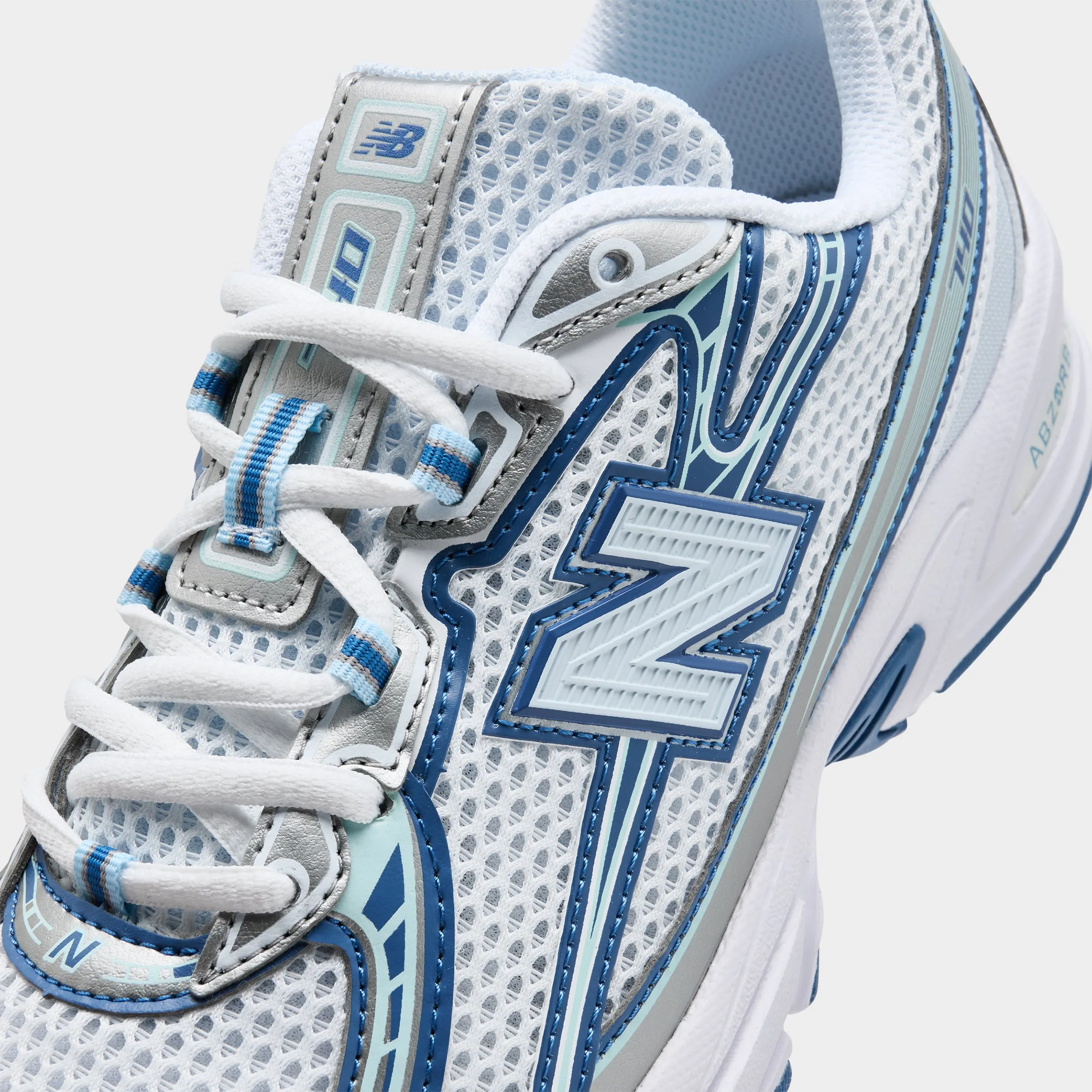 New Balance Juniors' 740 White / Blue obstacle course shoes