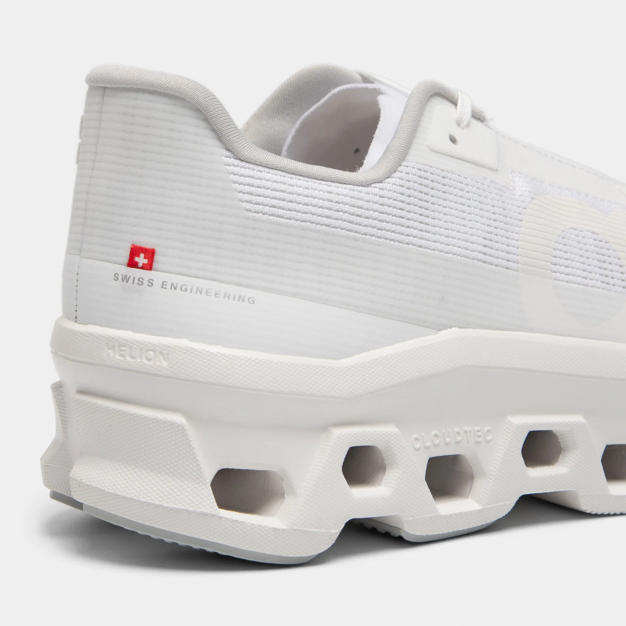 On Cloudmonster Void White / White obstacle - course - race running with a reflector