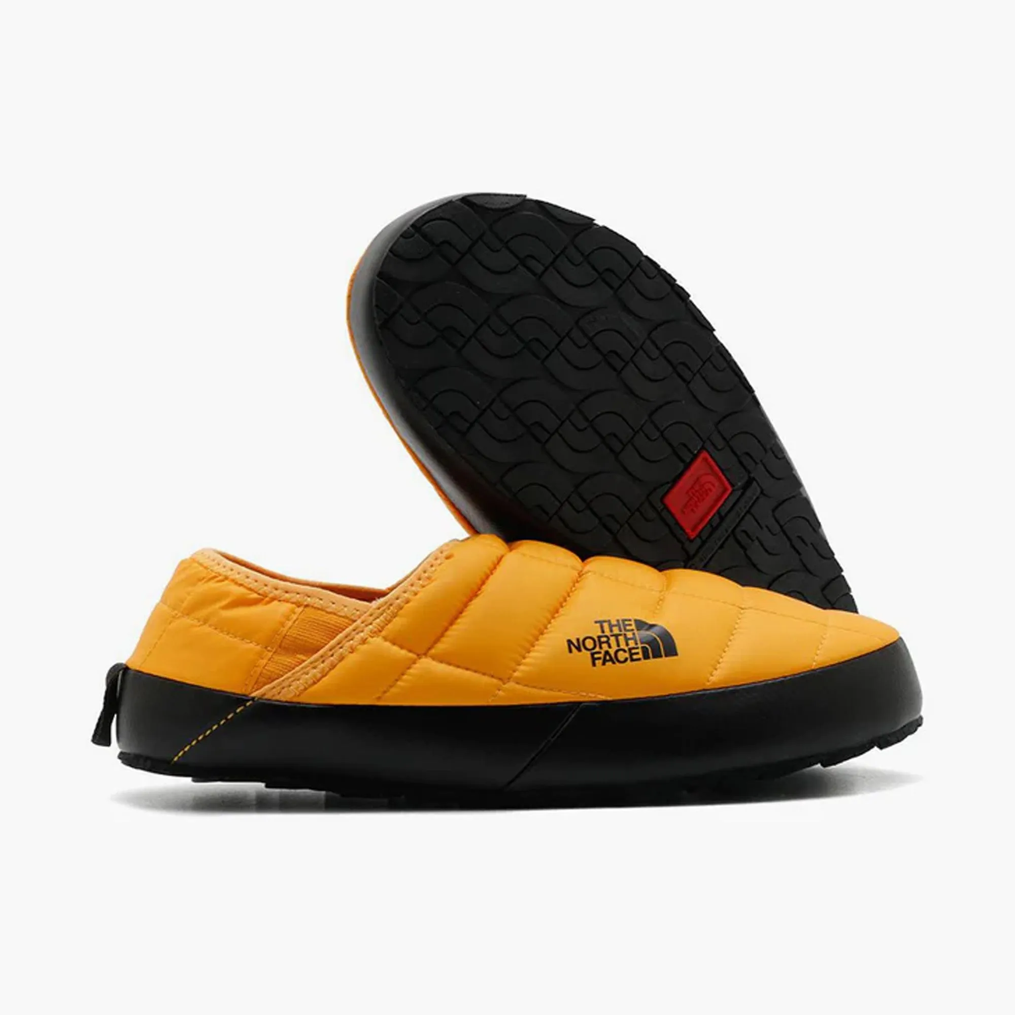 The North Face Thermoball Traction Mule V Summit Gold / TNF Black Grip Pattern
