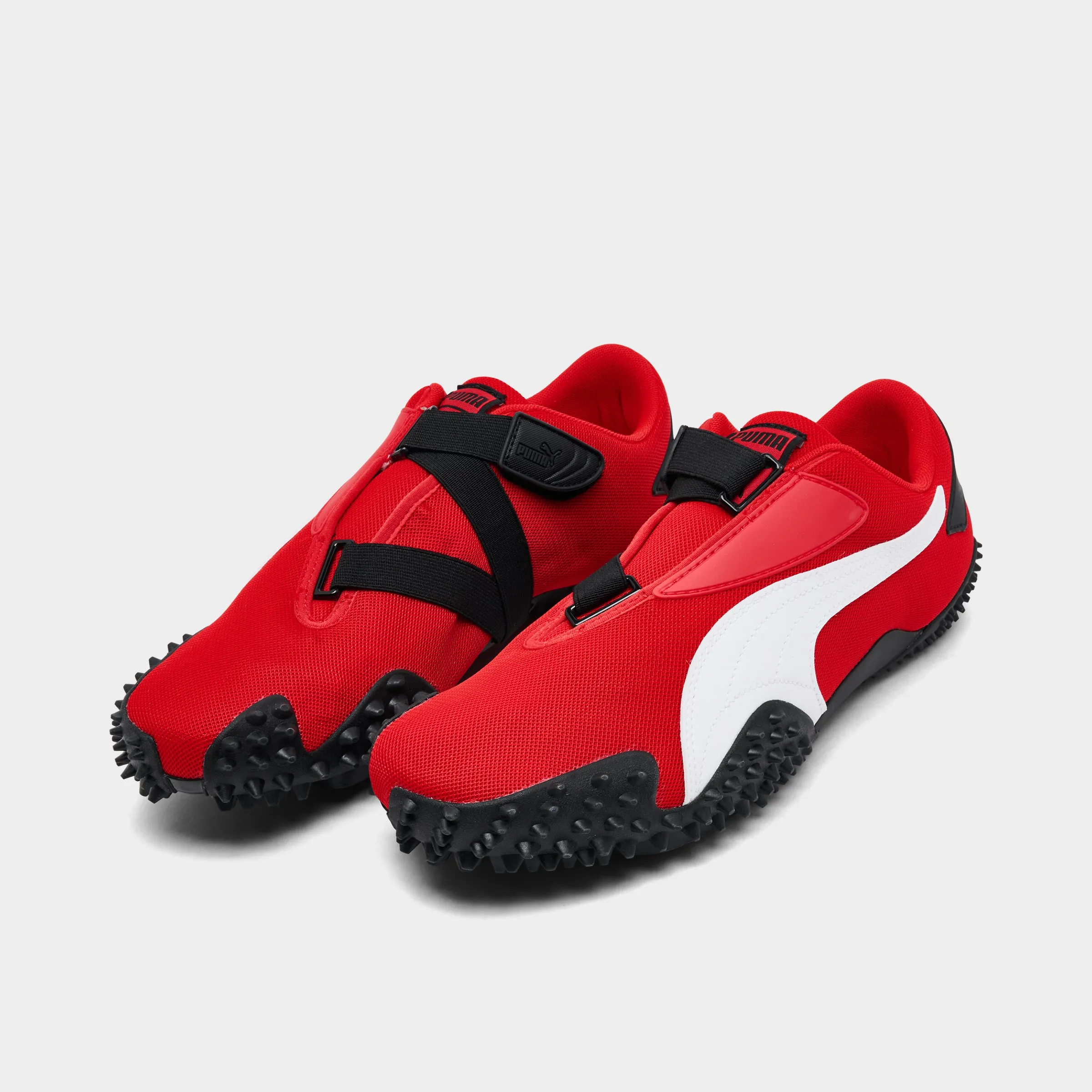 asphalt - road - runner running in a basketball court area shoes Puma Mostro OG Red / White - Black