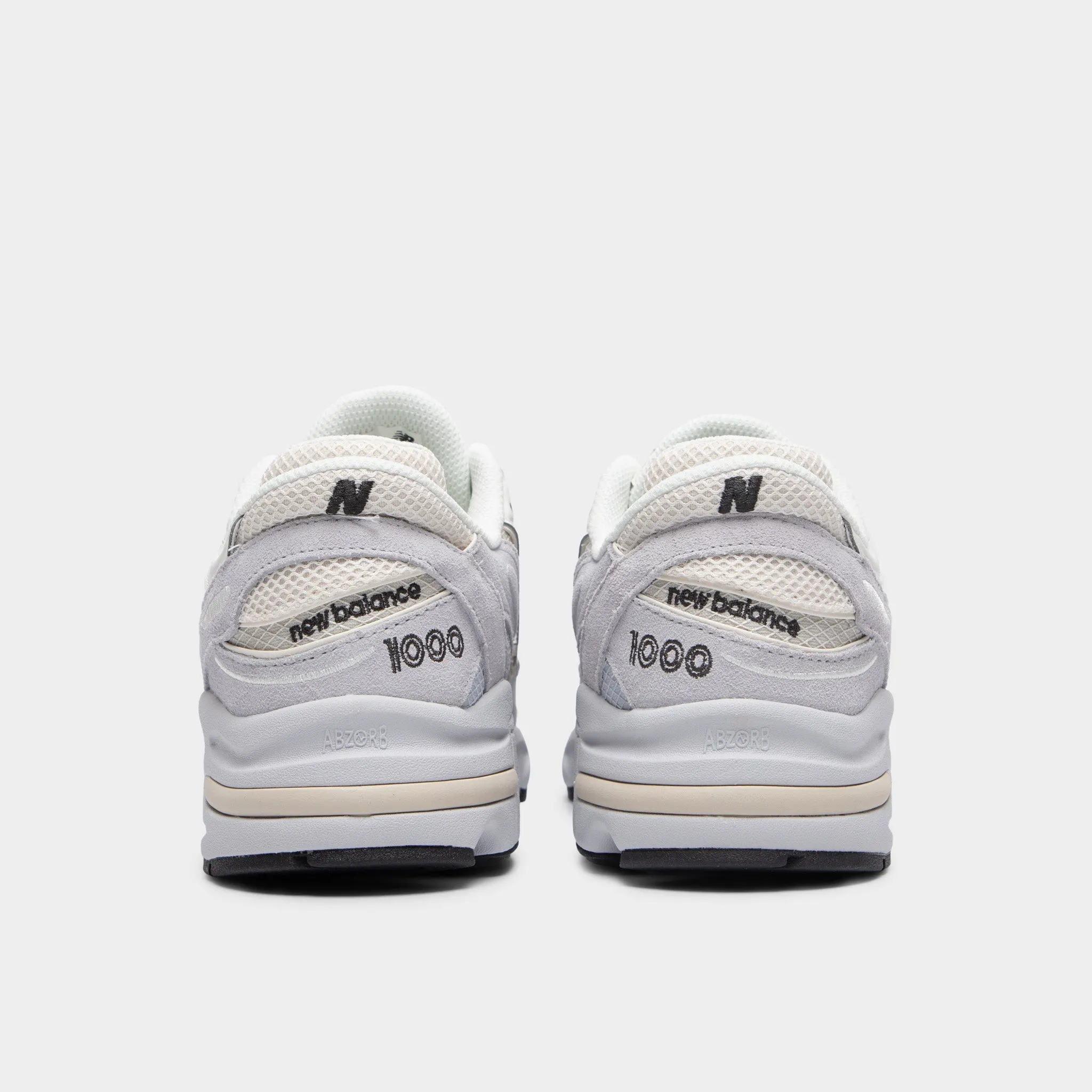 New Balance M1000 Pearl / Black athlete in training