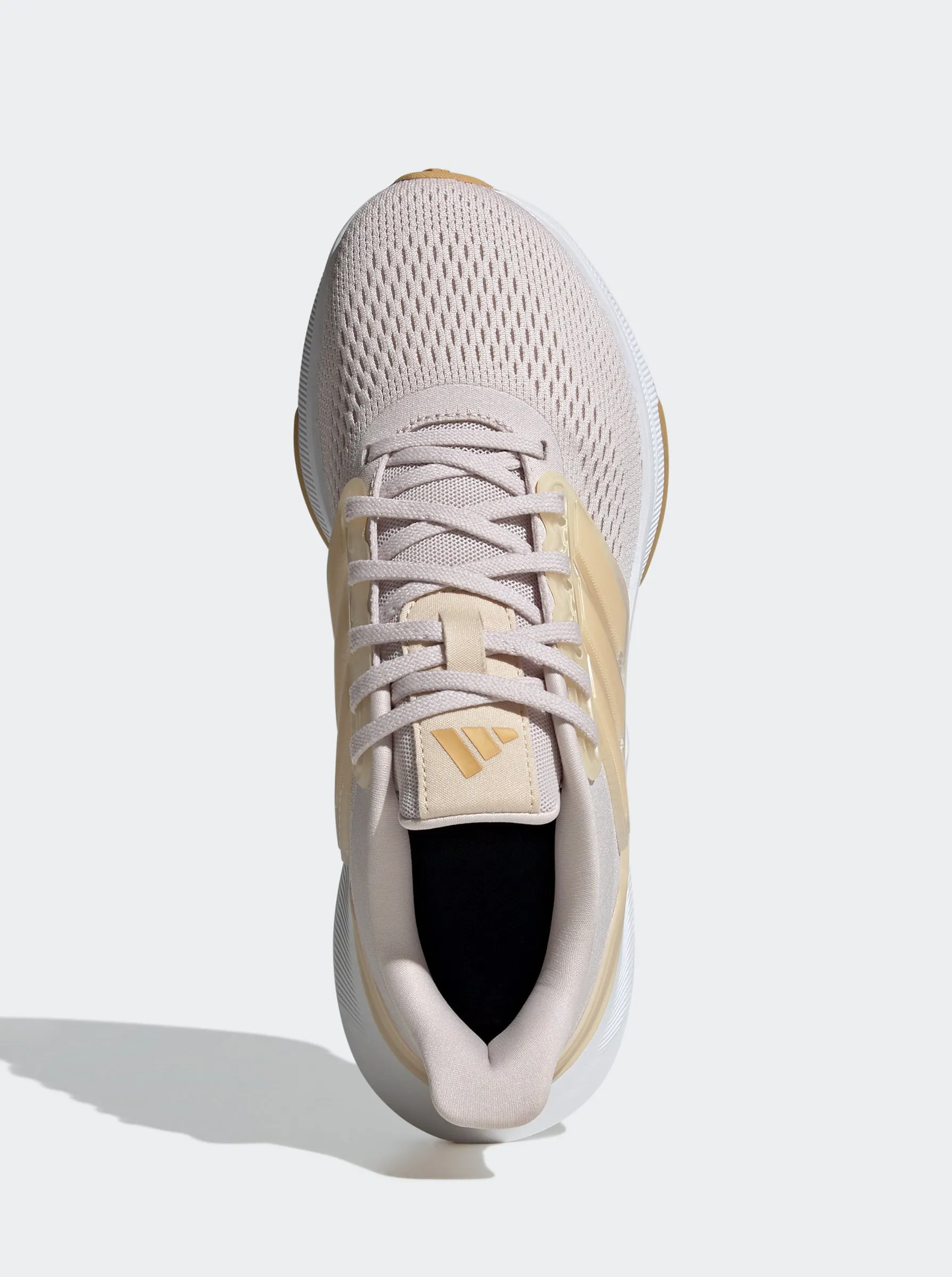 Ultrabounce Womens Rocker sole running on a dirt path